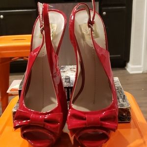 Red peep toe heels